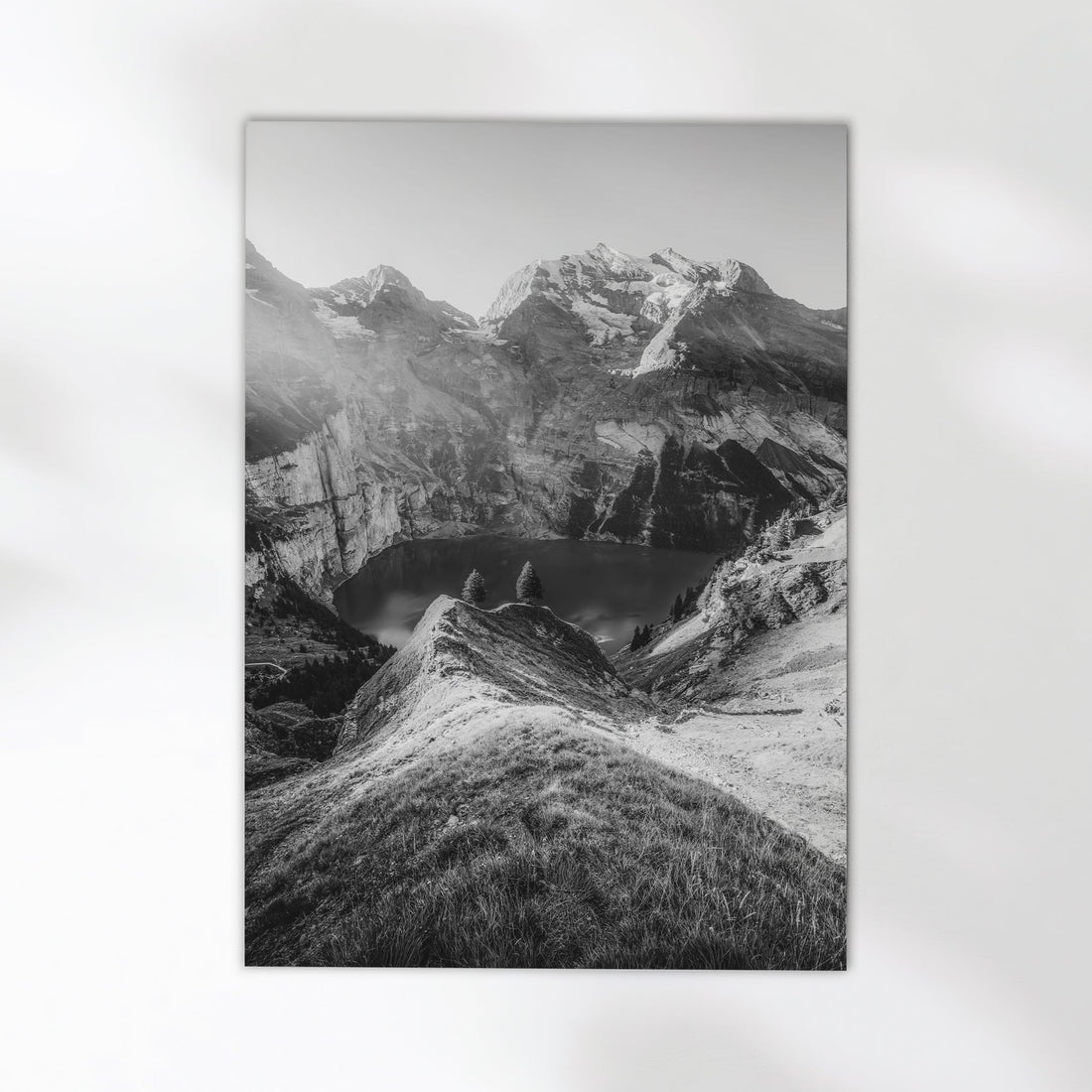 Stunning landscape print of Oeschinensee, nestled in the Swiss Alps, with breathtaking mountain reflections.