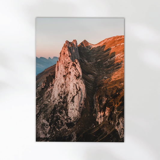 Breathtaking Swiss Alps wall art featuring the jagged peaks of Saxer Lücke bathed in golden light.
