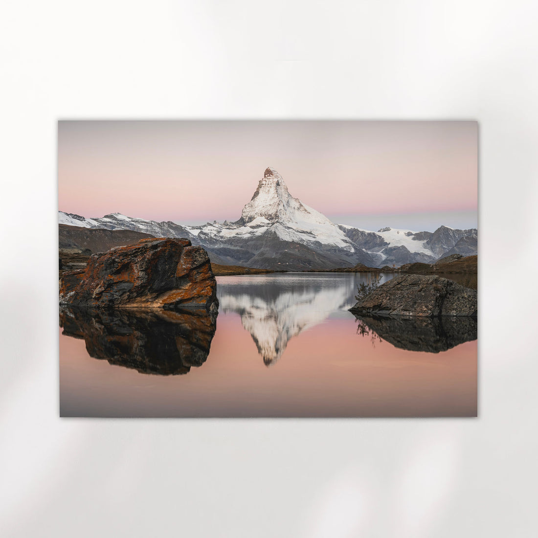 Swiss Alps photography print capturing the Matterhorn reflected in Stellisee at golden hour near Zermatt.