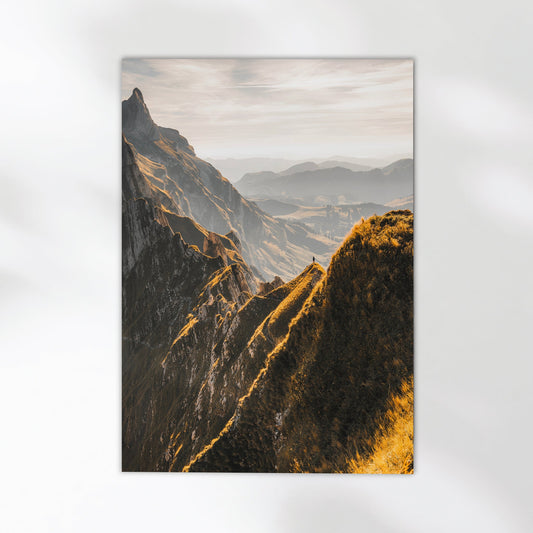 Breathtaking Swiss ridgeline hiking print capturing dramatic mountain peaks at sunrise.