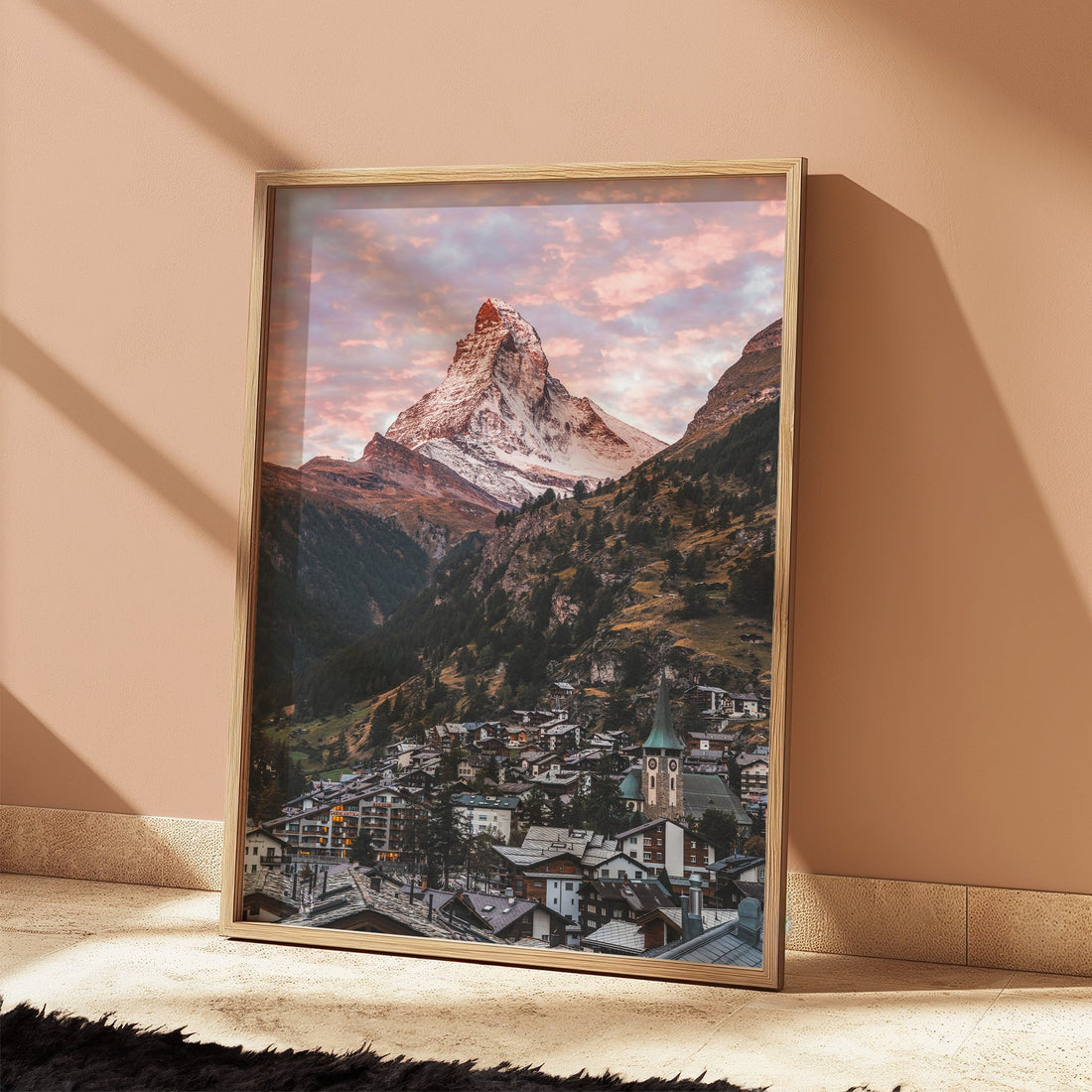 Picturesque Zermatt village wall art print with the towering Matterhorn in a pink-hued sunset.
