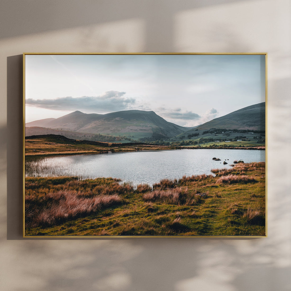 Tewet Tarn print with golden light over lake and mountain landscape
