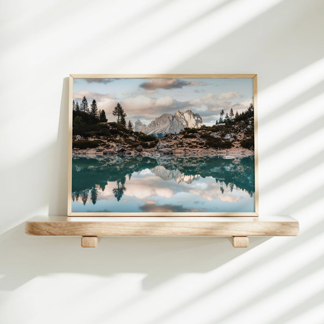 Sunset light on Tre Cime viewed from Lago di Sorapis, featured in this moody, nature-inspired mountain photography print.