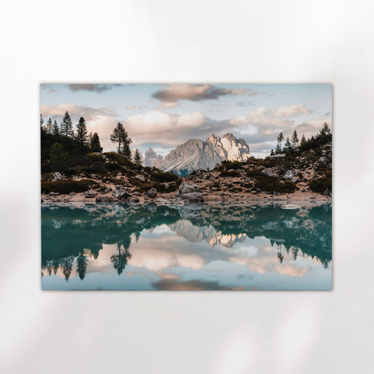 Tre Cime di Lavaredo reflected in Lago di Sorapis, captured in soft evening light as a premium Dolomites photography print.