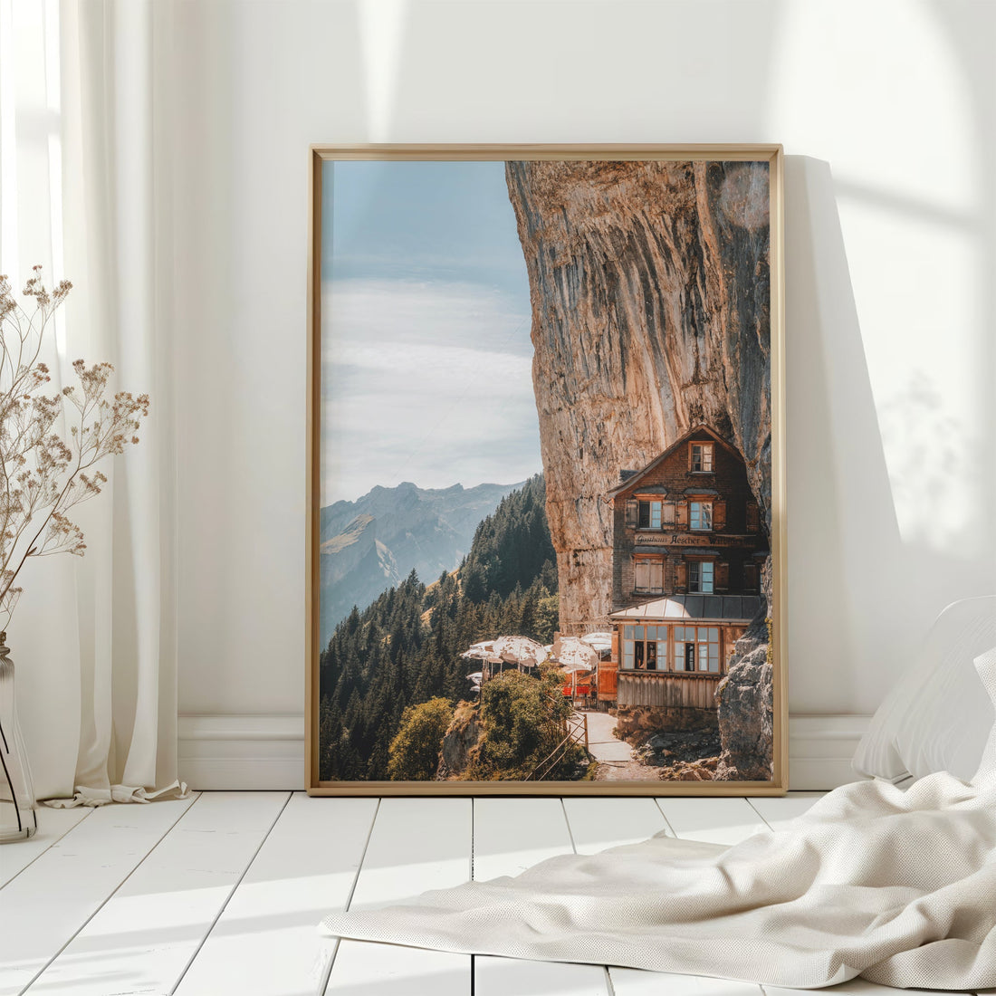 Aescher Guesthouse, an extraordinary Swiss mountain lodge built into a sheer rock cliff.