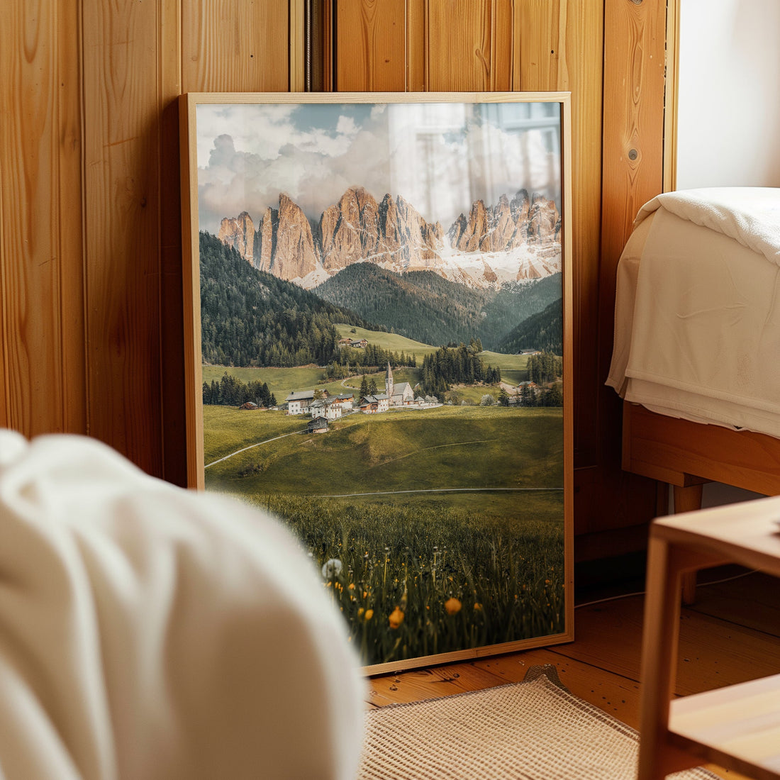 Sunset Dolomites print styled in wooden bedroom interior