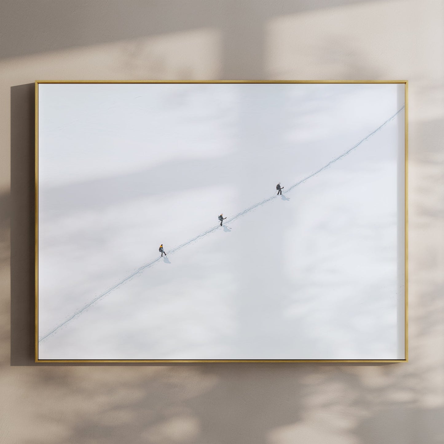 Minimalist Vallée Blanche wall art print featuring three mountaineers crossing snowy terrain in Chamonix.