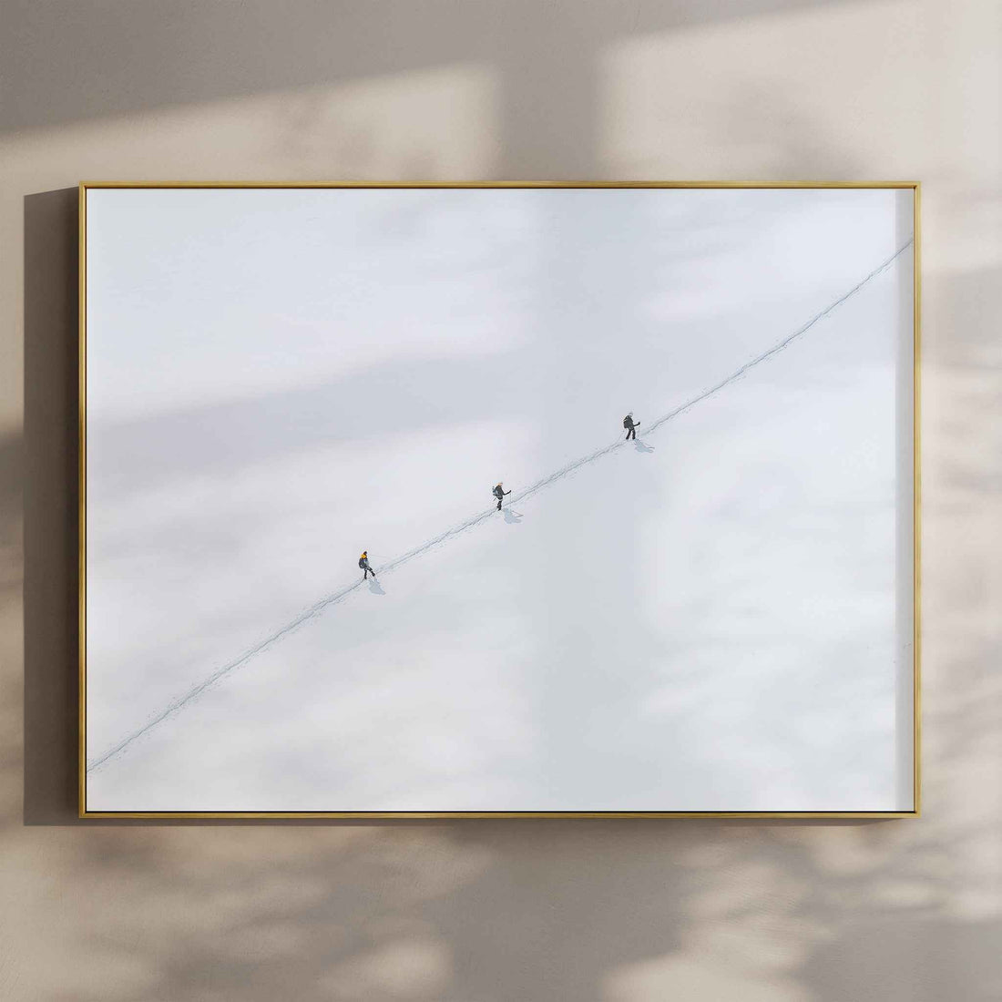 Minimalist Vallée Blanche wall art print featuring three mountaineers crossing snowy terrain in Chamonix.