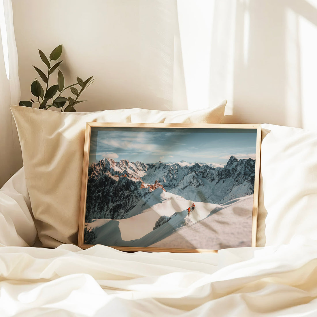 Vertical wall decor print showing two hikers ascending a high-altitude route on Aiguille du Midi near Chamonix.