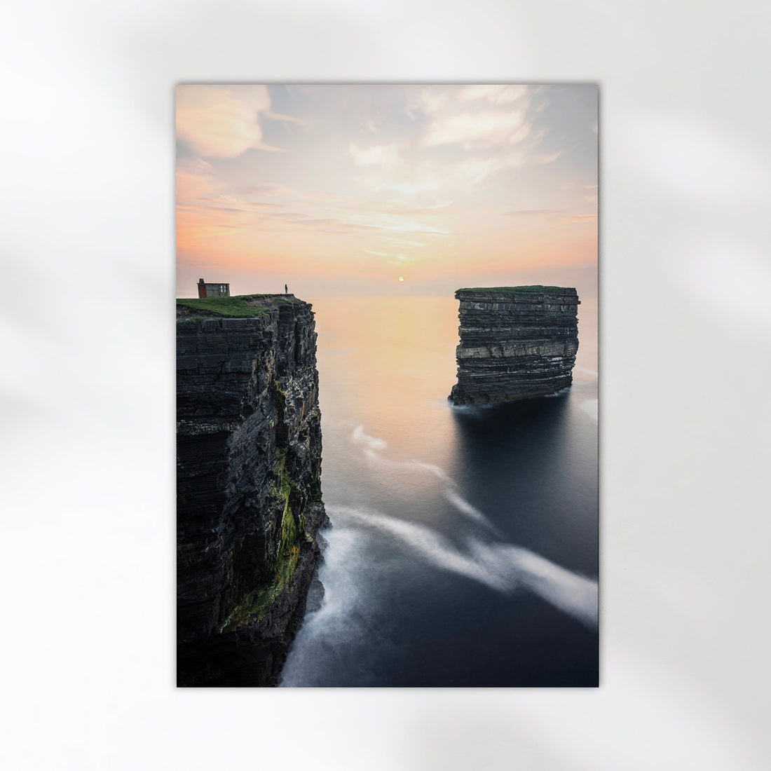 Soft light over Downpatrick Head cliffs and sea stack on Ireland’s Wild Atlantic Way.