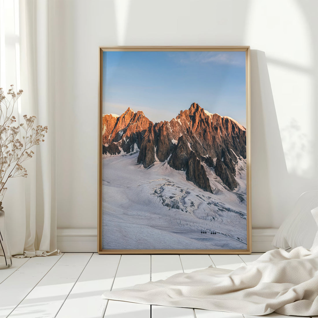 Winter alpine landscape photography of Mont Blanc du Tacul, featuring snow-covered ridges and golden light.