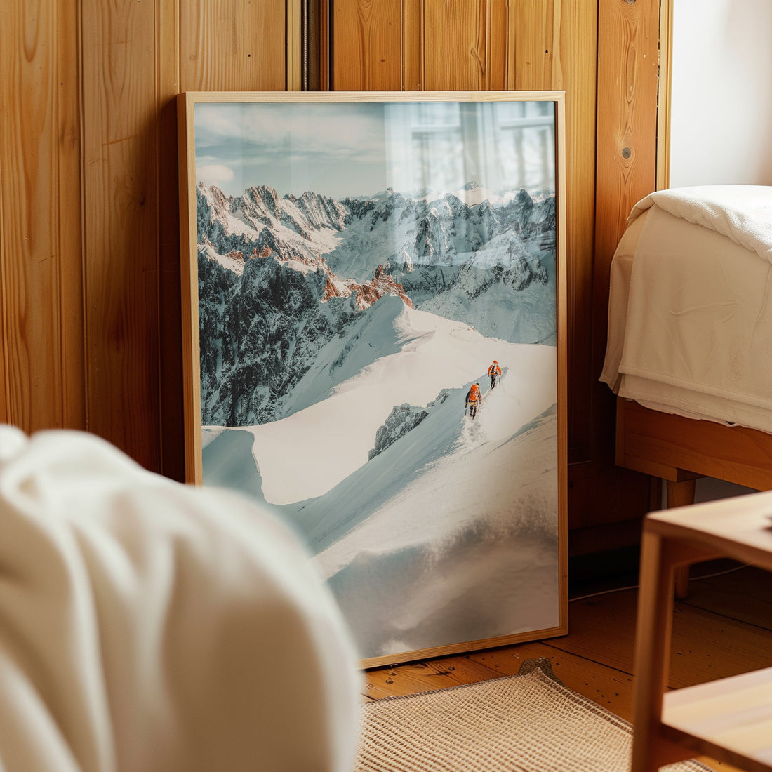 Striking wall art print of winter alpinists tackling the icy slopes of the Mont Blanc Massif.