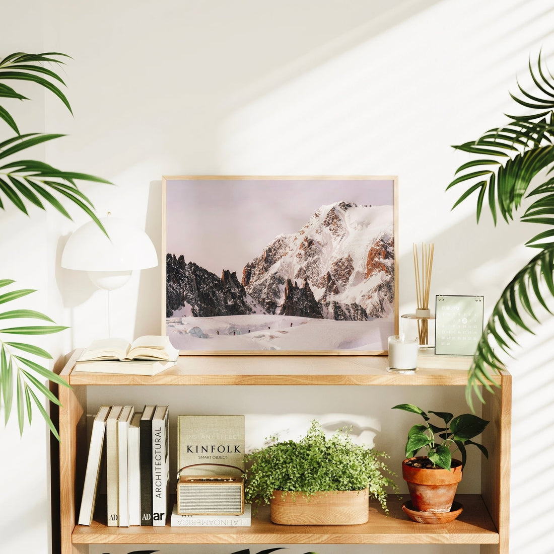 Winter mountaineering photography print featuring adventurers ascending the snowy peaks of the Mont Blanc Massif.