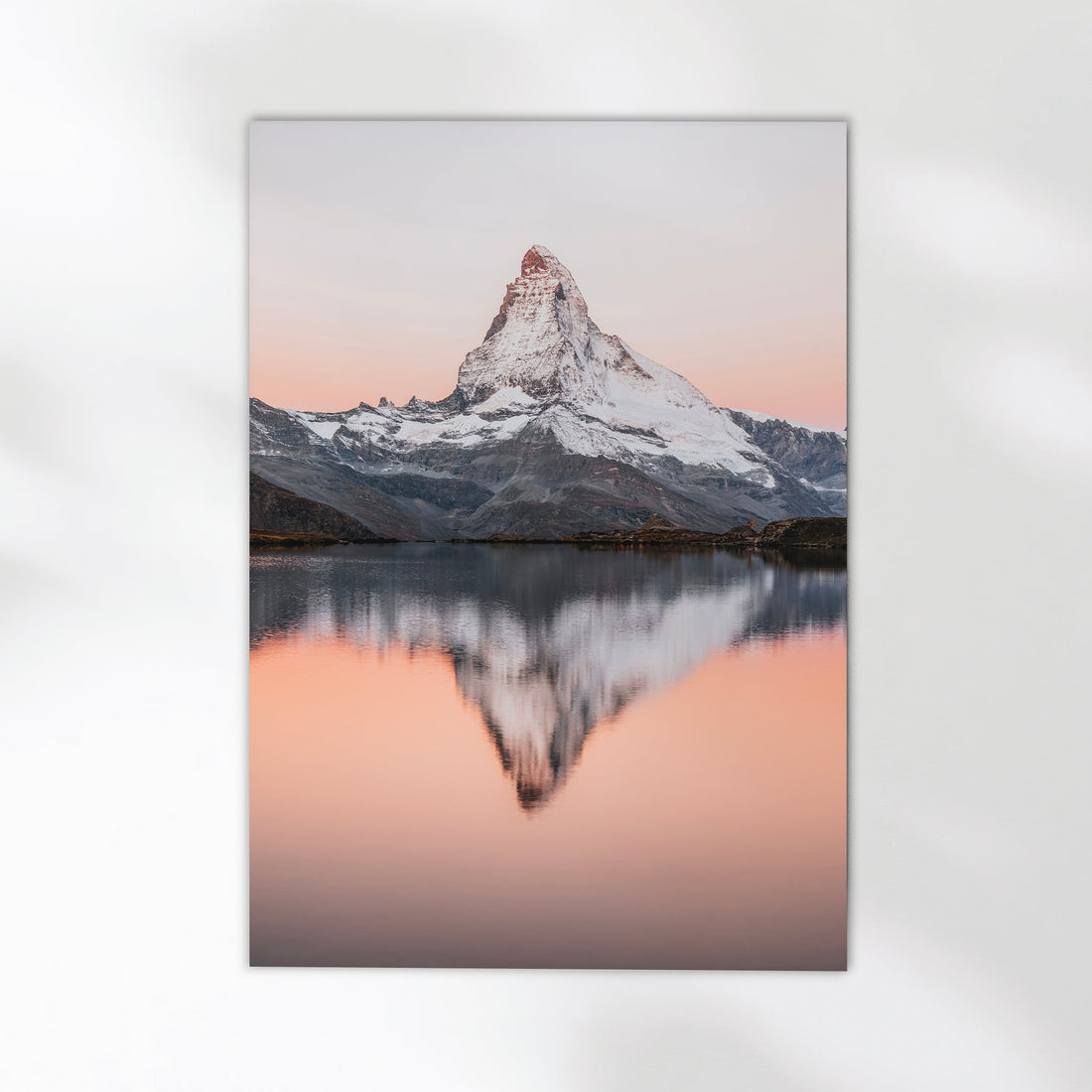 Scenic Zermatt wall art featuring the stunning Matterhorn mirrored in the still waters of Stellisee.