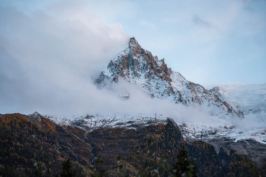 A stormy cloud rolling onto the Aiguille du Midi, creating a dramatic autumny feel.