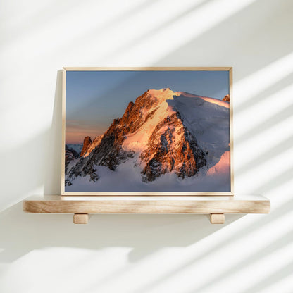 Framed Mont Blanc du Tacul wall art hung on a minimal white wall with soft natural light