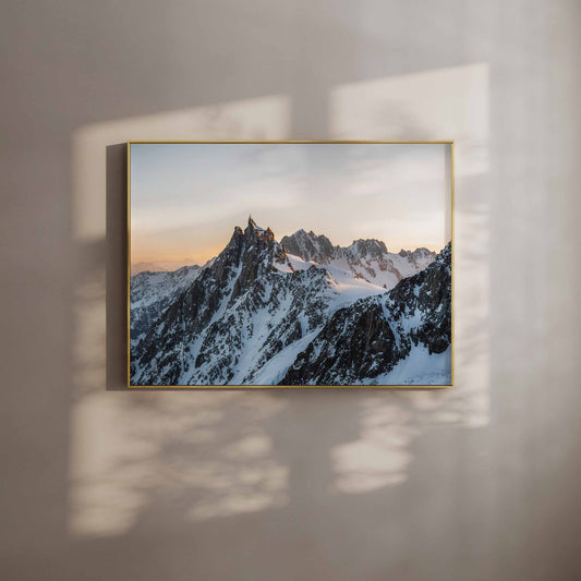 Framed Aiguille du Midi wall art print capturing the mountain at sunset, perfect for Chamonix lovers.