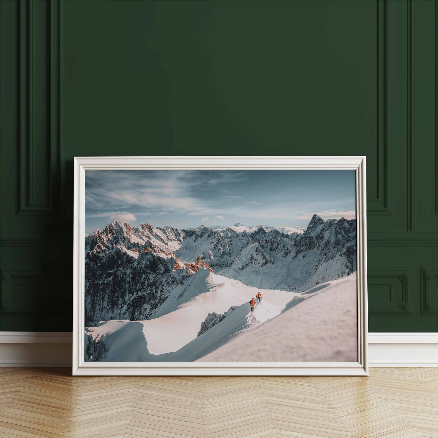 Framed alpine landscape print showcasing mountaineers on the Aiguille du Midi arete, leaning against a green wall.