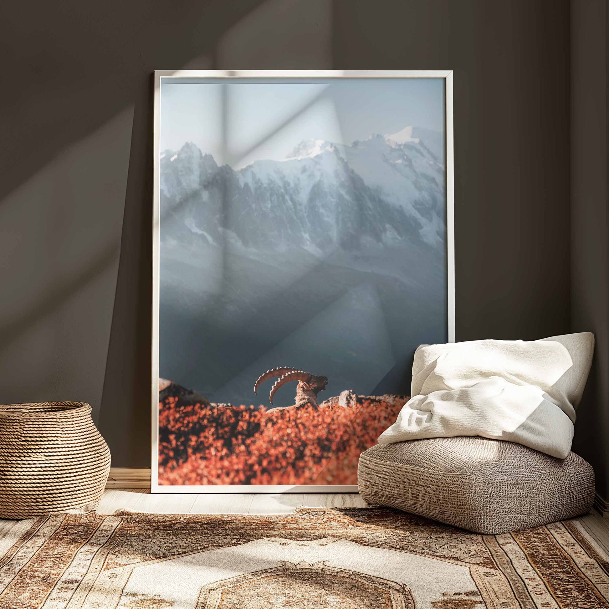 Wall art of ibex at sunset overlooking Mont Blanc, showcased in a minimalist white frame