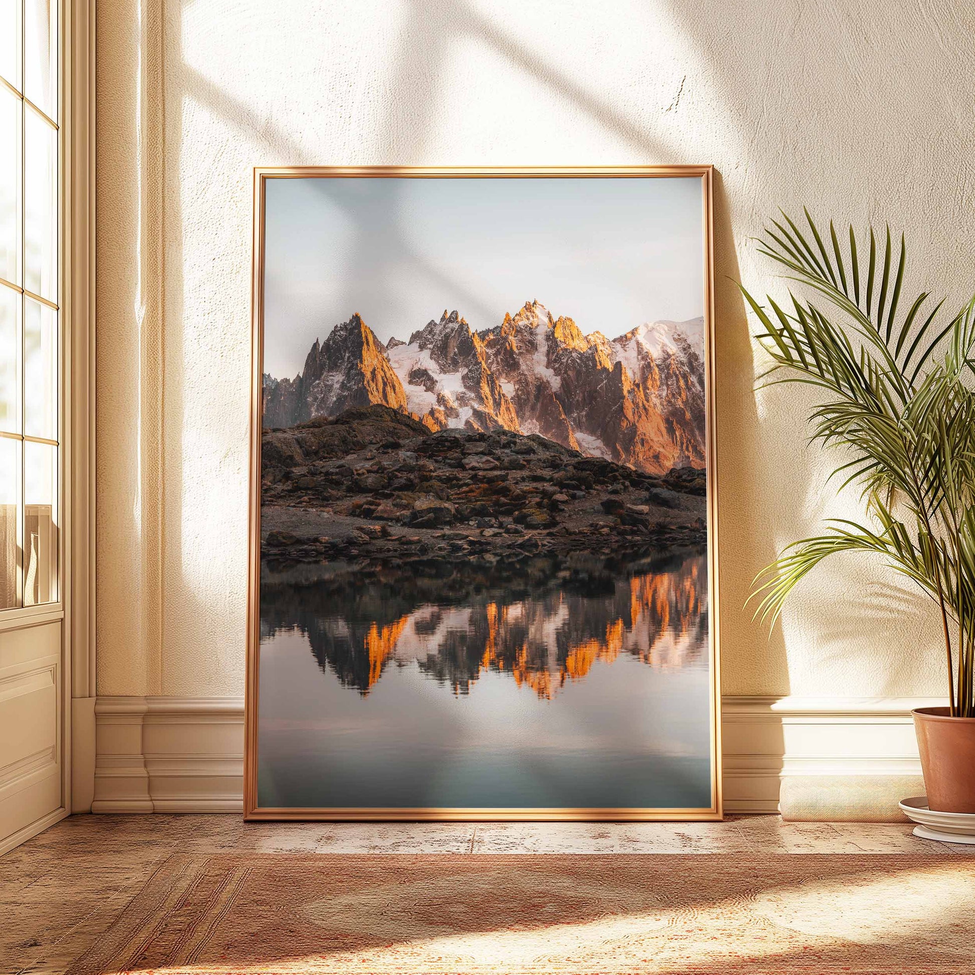 Warm alpine sunrise over Lac Blanc in Chamonix, perfectly paired with a light wooden frame.