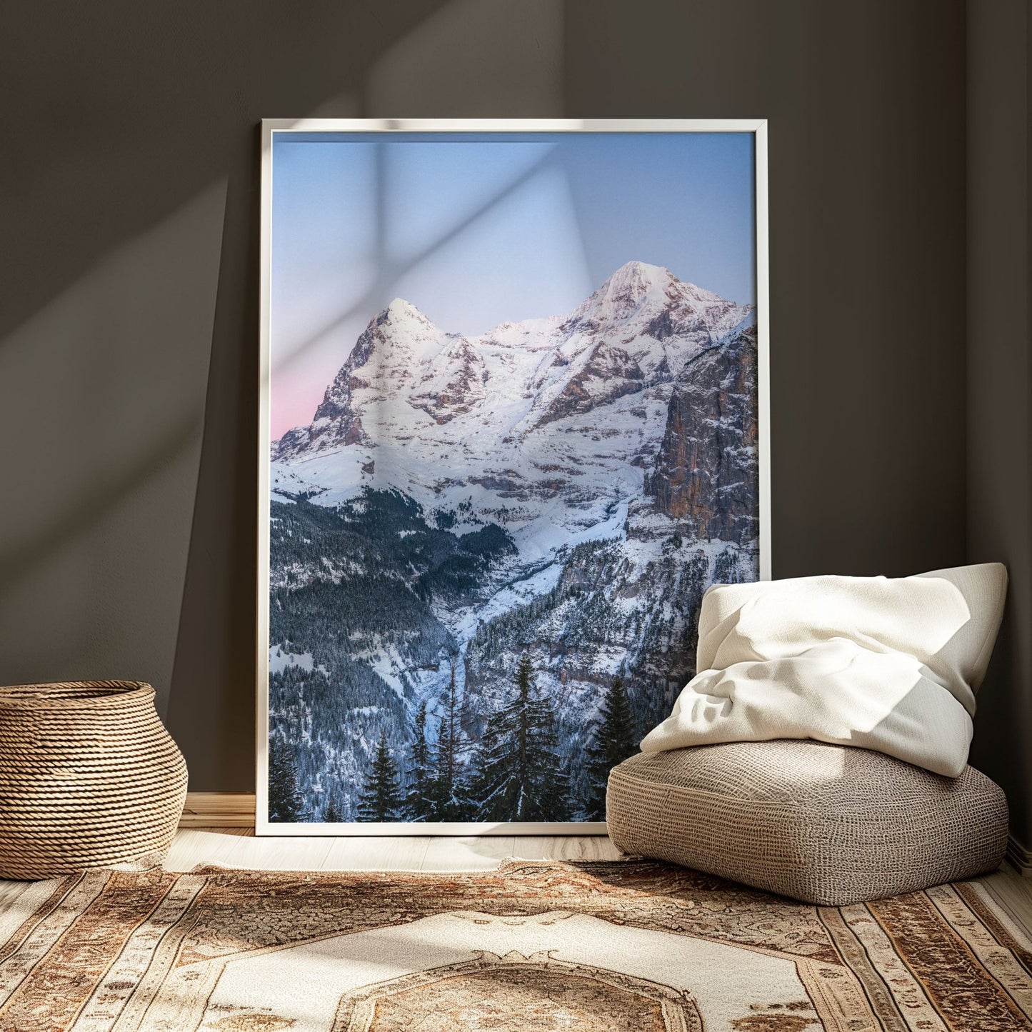 Sunset over the Eiger and Mönch mountains captured in vibrant hues of pink and blue.