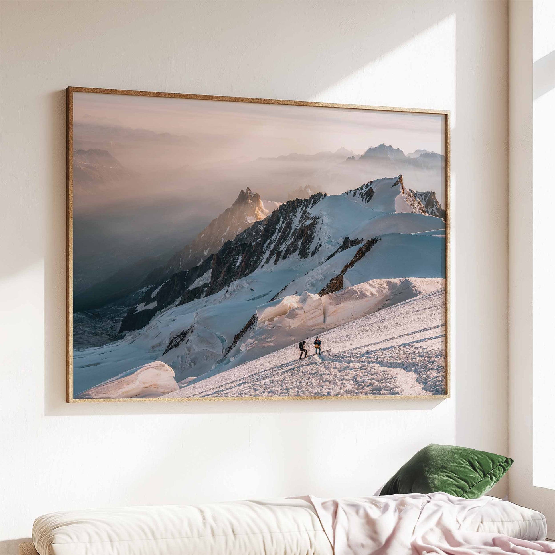 Framed print of two mountaineers scaling Mont Blanc during golden hour.