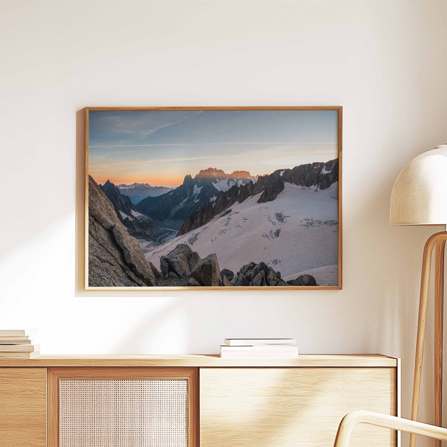 Sunset over Mer de Glace glacier, Chamonix, in a wooden frame on a minimalist shelf.