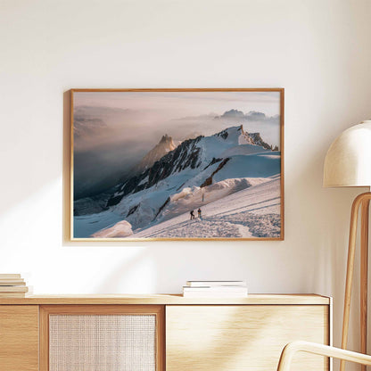 Wall art featuring mountaineers ascending Mont Blanc with panoramic snowy views.