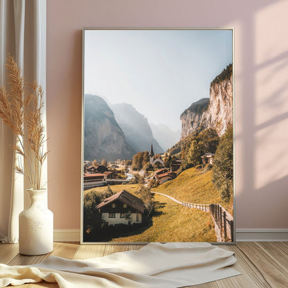 Beautiful view of Lauterbrunnen village surrounded by lush green valleys and rocky cliffs.