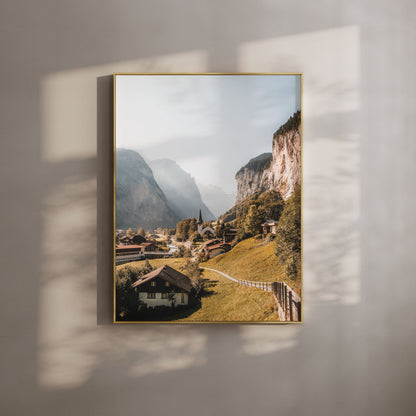 Scenic view of Lauterbrunnen Valley with mountains and traditional Swiss village houses.