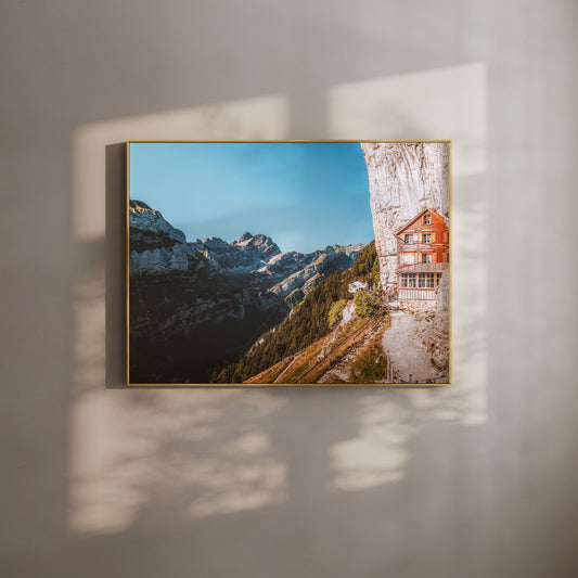 Aescher Guesthouse perched on a cliffside in Appenzell, surrounded by the Swiss Alps, perfect for mountain wall art.