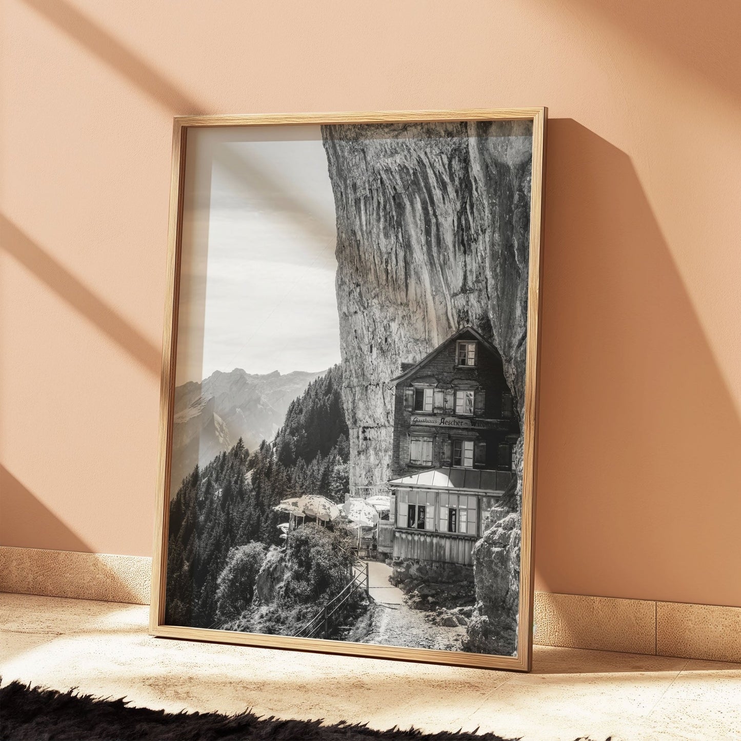 Monochrome print of Aescher Guesthouse in Switzerland, blending dramatic cliffside architecture with alpine landscapes, perfect for mountain wall art.