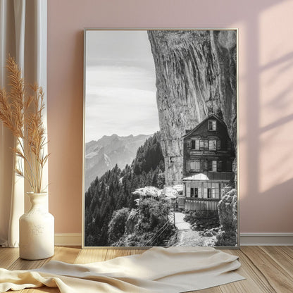 Black-and-white artwork of Aescher Guesthouse, perched on a cliff in the Swiss Alps, featuring dramatic views for elegant nature-inspired decor.