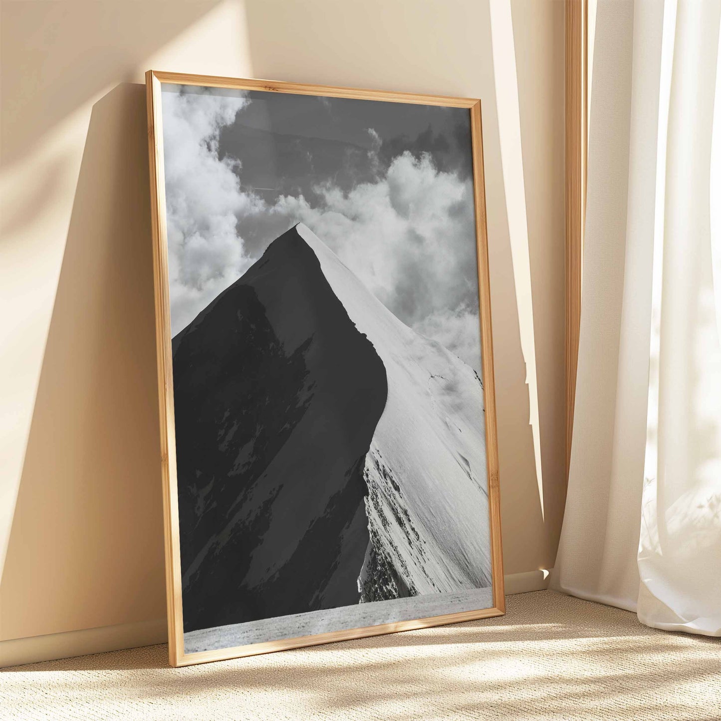 Black-and-white depiction of the Aiguille de Bionnassay summit, evoking alpine elegance and rugged beauty