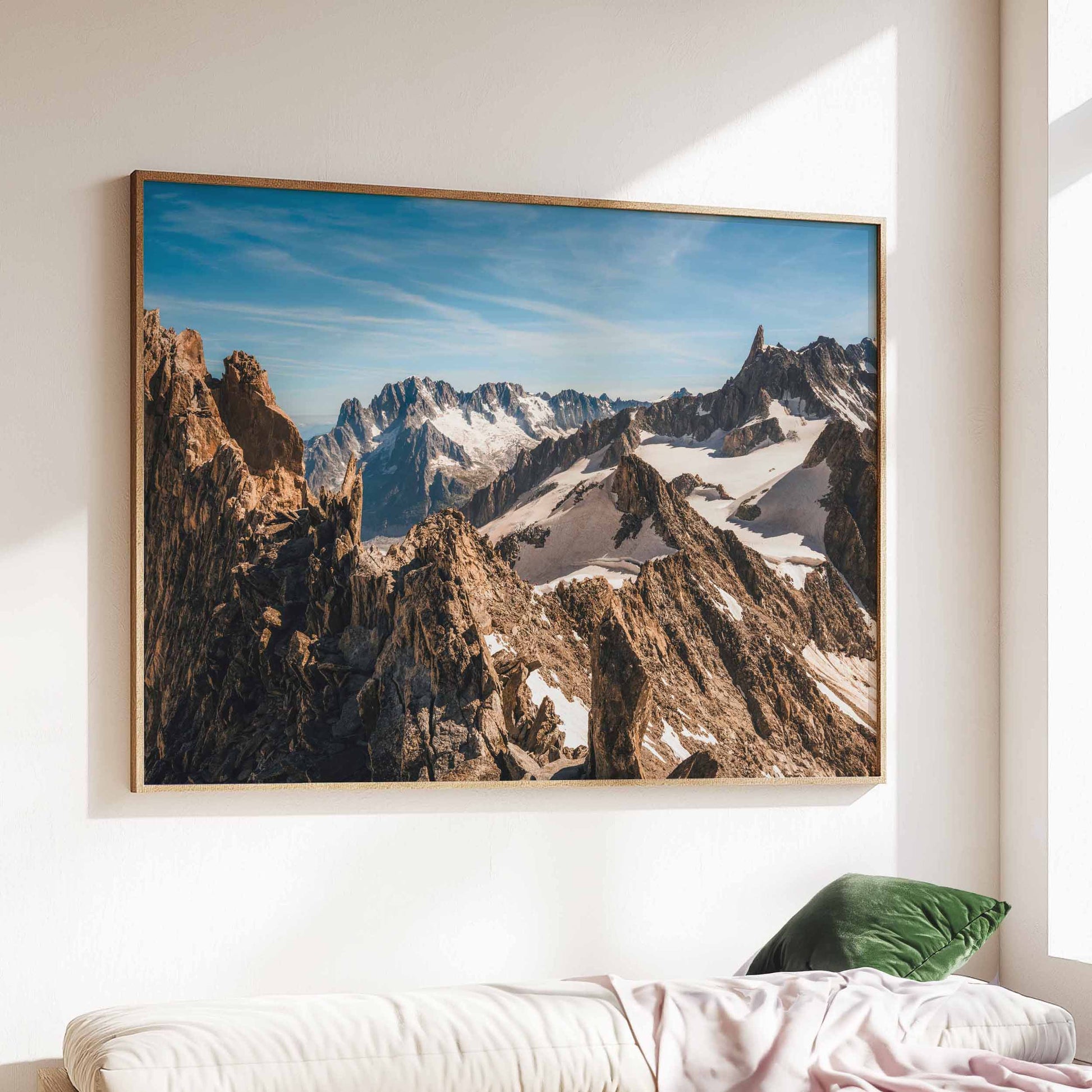 Alpine landscape wall art featuring Aiguille d'Entrèves peaks under a sunny sky, presented in a minimalist white frame.