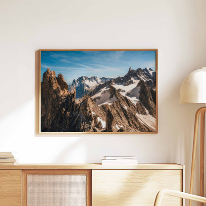 Scenic Aiguille d'Entrèves mountain wall art with sharp rocky formations, displayed in a natural wooden frame.