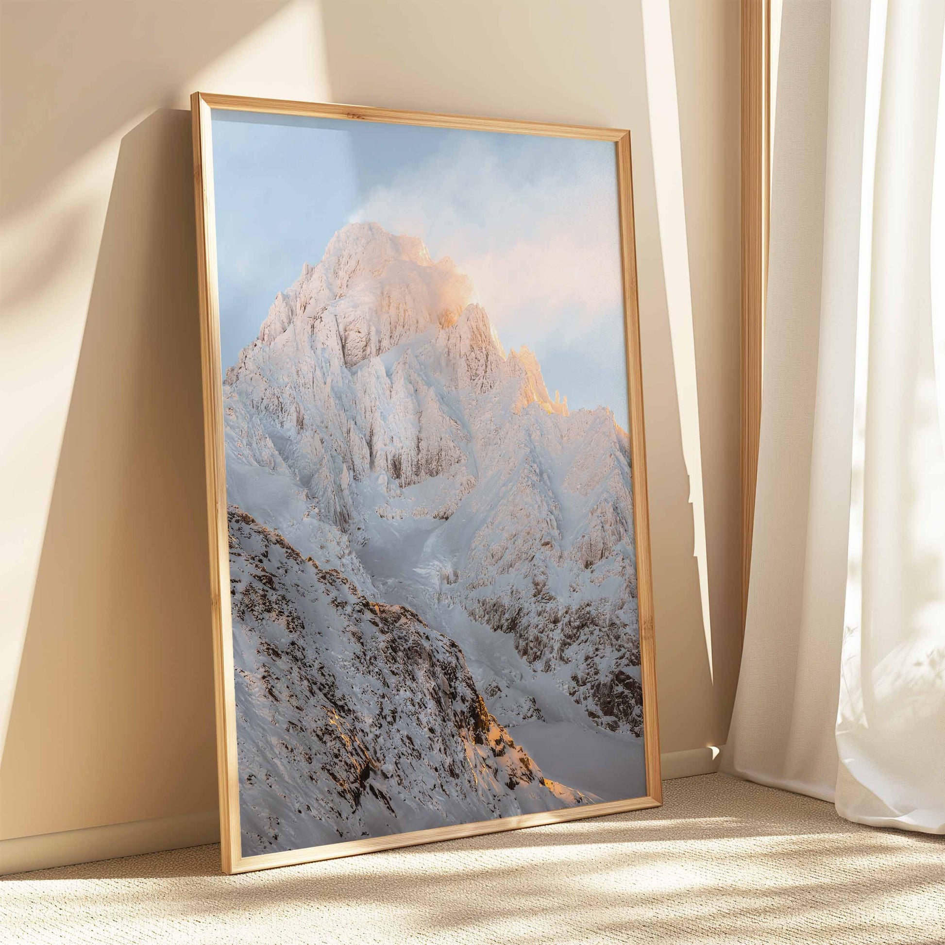 Majestic Aiguille du Chardonnet glowing under soft sunset light, offering a timeless alpine landscape for contemporary wall decor.