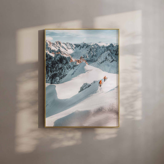 Mountaineers traversing the Aiguille du Midi Arête with breathtaking alpine vistas in Chamonix.