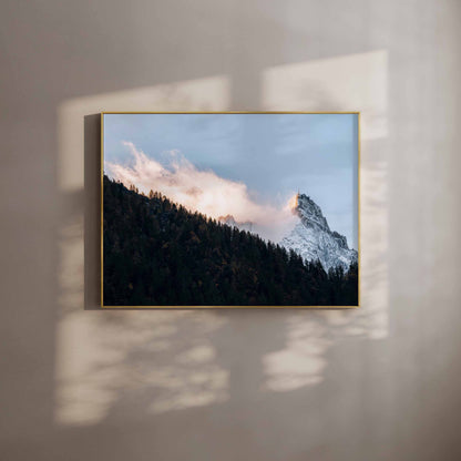 Wall art print of Aiguille du Midi in Chamonix with golden light and snowy peaks, perfect for mountain and nature enthusiasts.