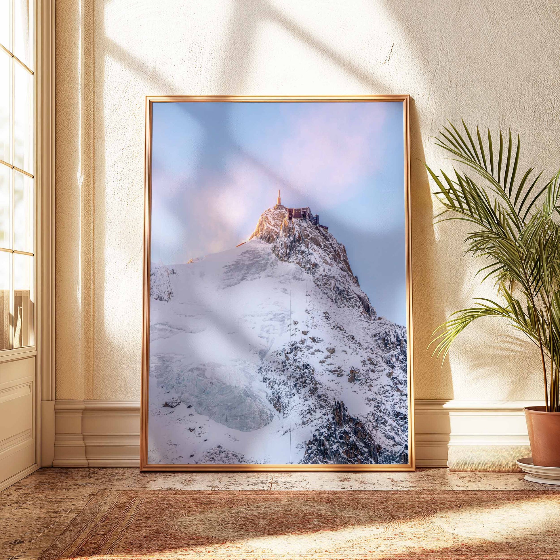 Golden hour light shining on the Aiguille du Midi in winter.