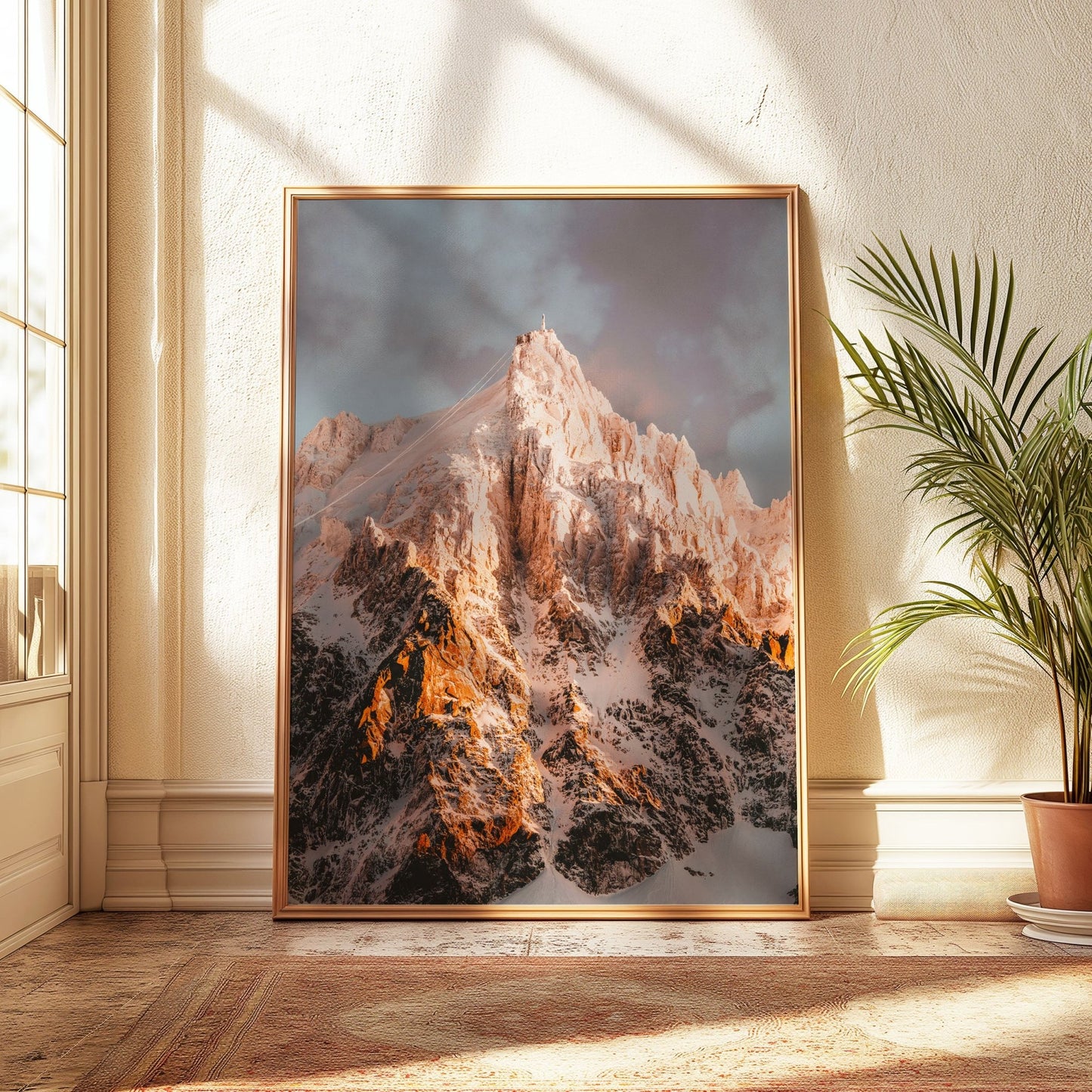 Aiguille du Midi's iconic snowy summit lit by soft evening light, capturing the grandeur of the French Alps.