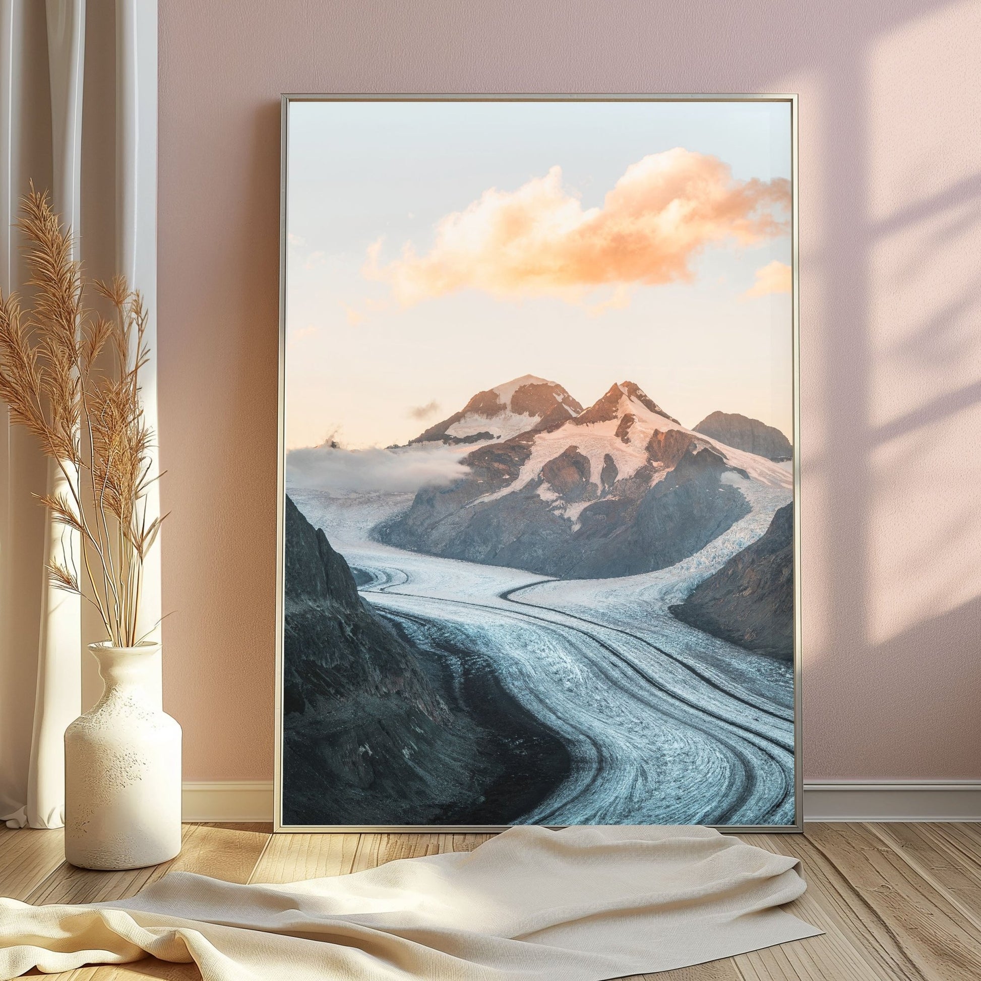 Aletsch Glacier and surrounding mountains at golden hour, displayed in a neutral frame.