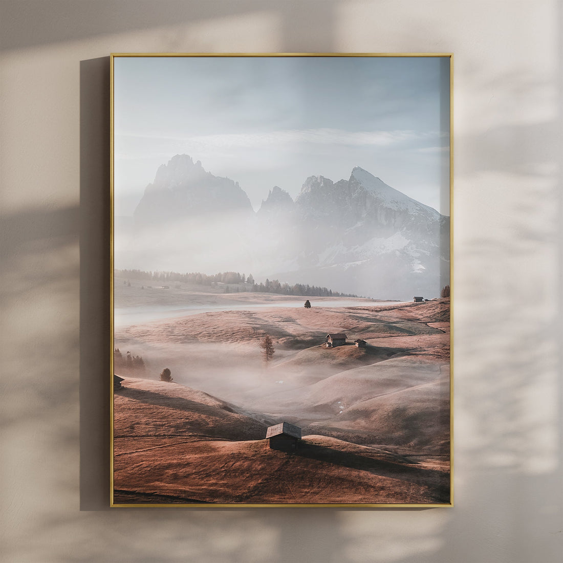 Alpe di Siusi Dolomites wall art print featuring early morning mist and rustic huts in soft alpine light.