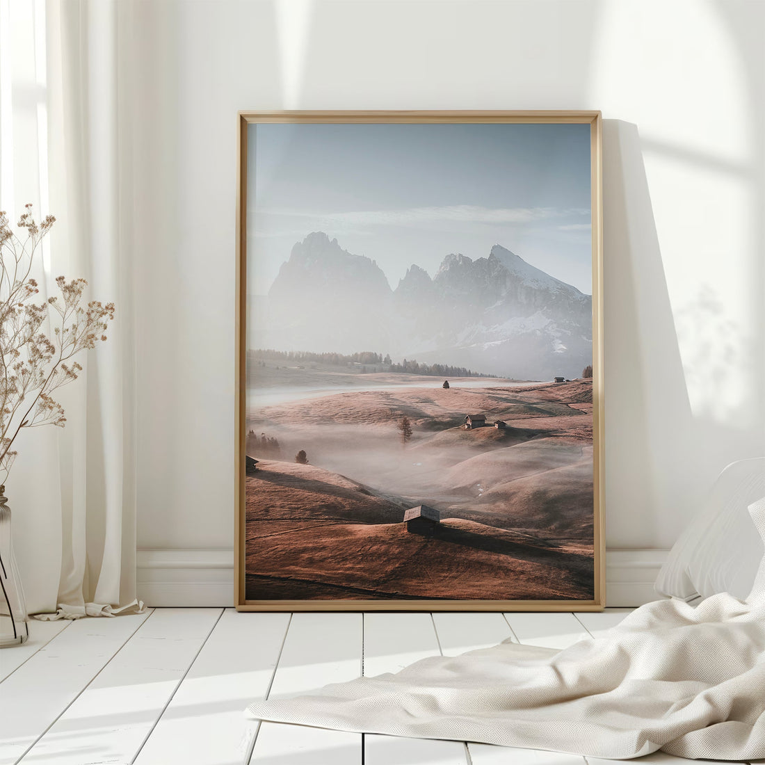 Morning light glows across Alpe di Siusi’s hills and cabins in this peaceful alpine photography print.