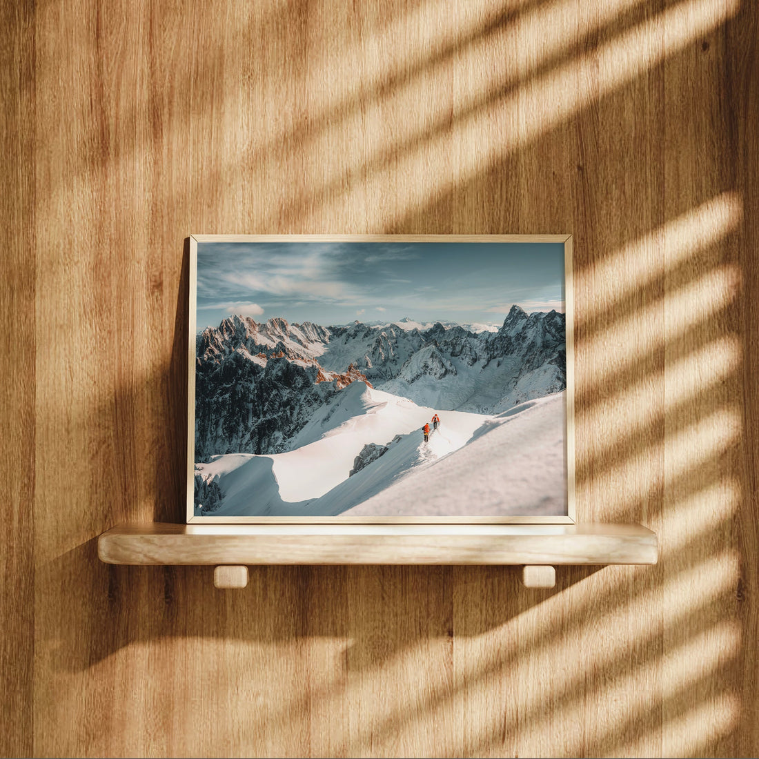 Adventure photography print with alpine climbers hiking Aiguille du Midi’s dramatic ridge in early sunlight.