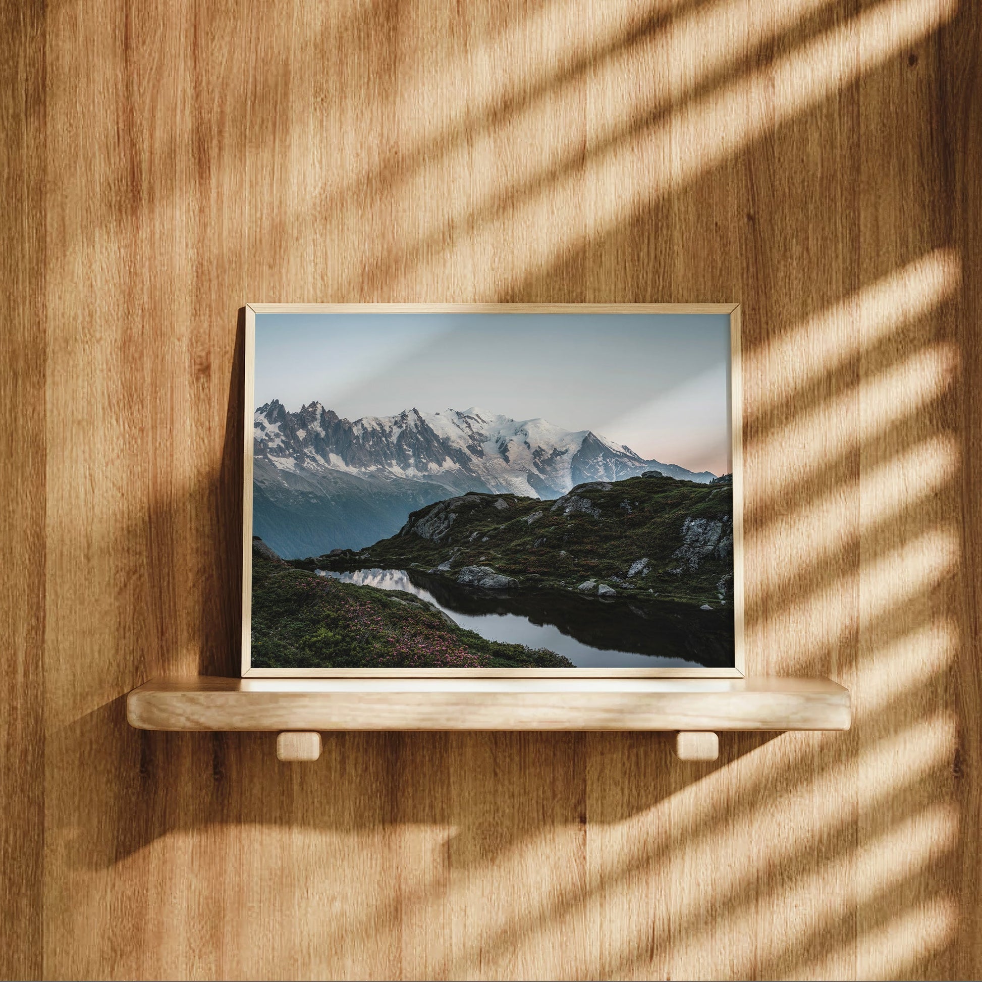 Scenic photography print of a crystal-clear alpine lake in the Mont Blanc region.