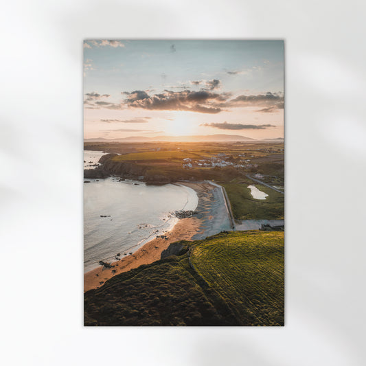 Unframed aerial print of Annestown Beach, Ireland, with warm sunset tones