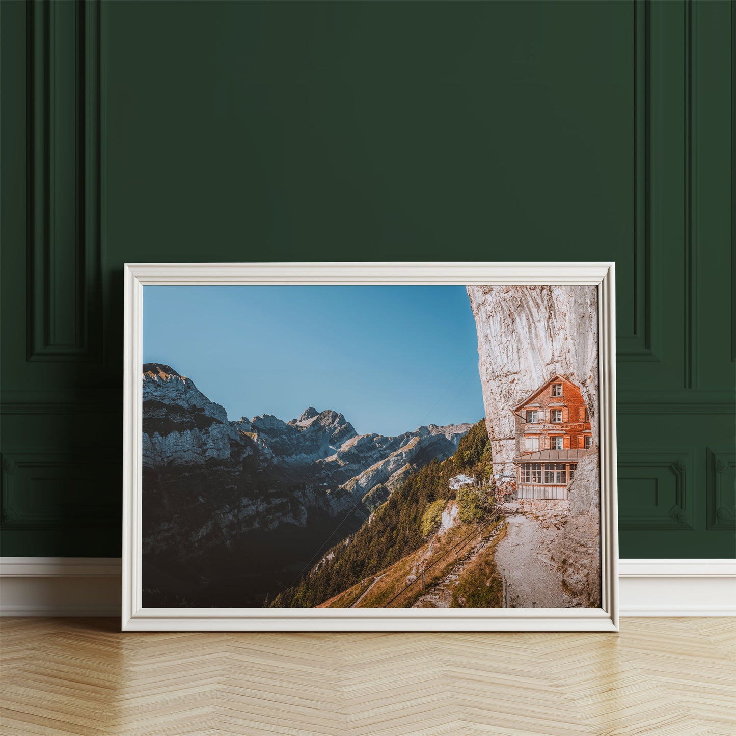 Swiss Alps scenery featuring Aescher Guesthouse built into a cliff in Appenzell, a unique mountain wall art piece.