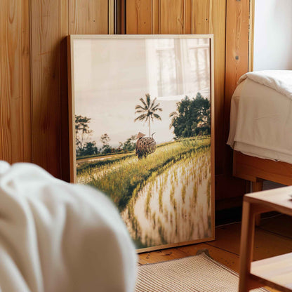 Framed Bali wall art print of rice fields displayed in a neutral living room interior