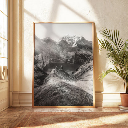 Black-and-white artwork of Oeschinensee Switzerland, highlighting the lake's tranquil beauty framed by towering alpine peaks under evening skies.